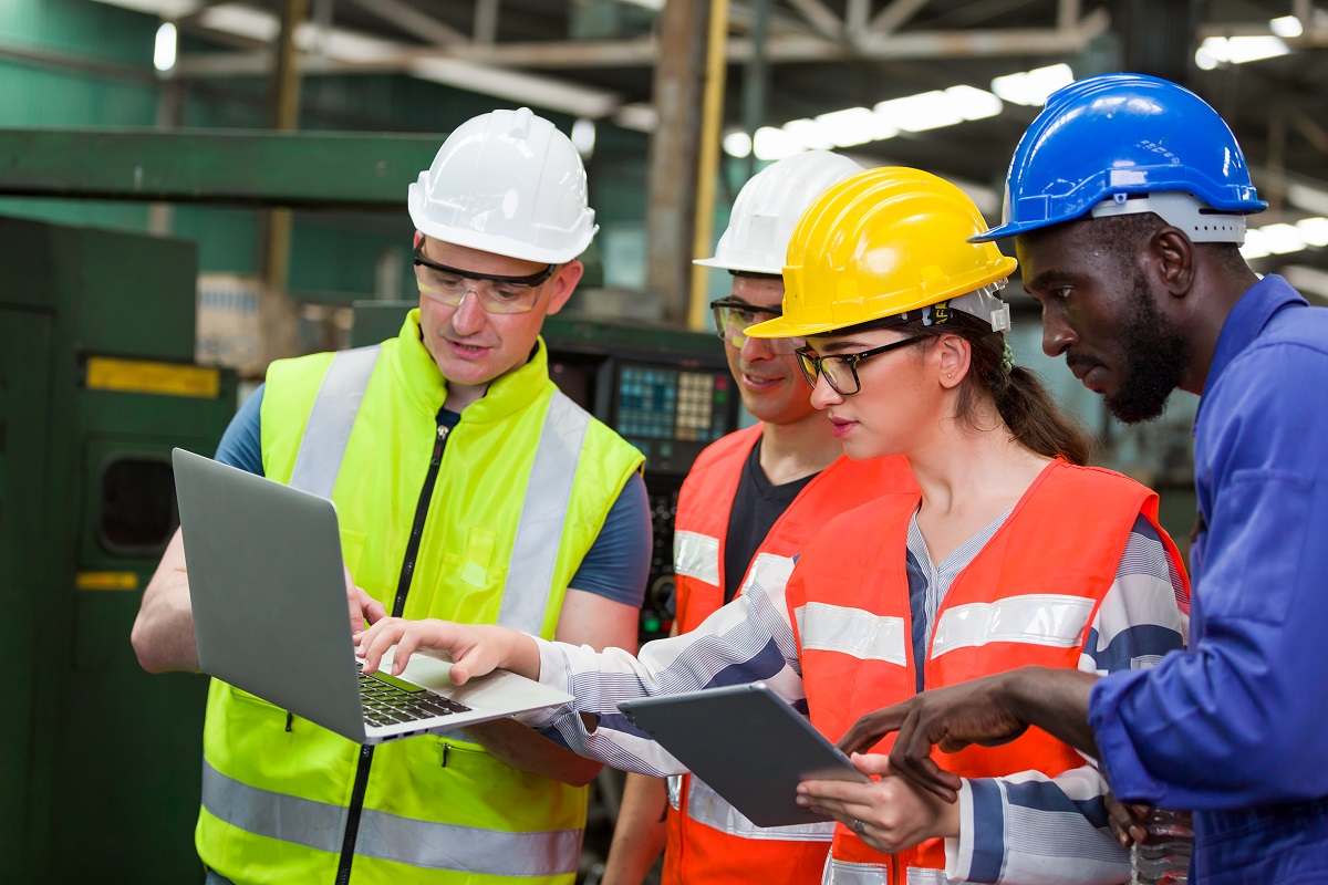 Quality Control Process Inspector writing a report